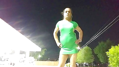 Amateur brunette in red dress shows her ass on the street