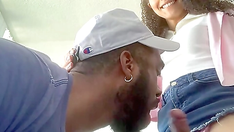 Ebony tranny gives a great blowjob to a big white dick