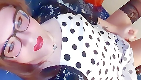 Red-haired brunette masturbates in her sexy stockings