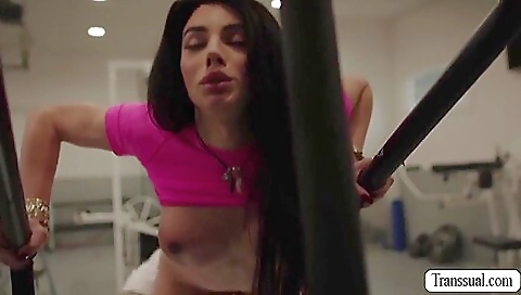 Busty redhead in the gym getting anal railed by the guy